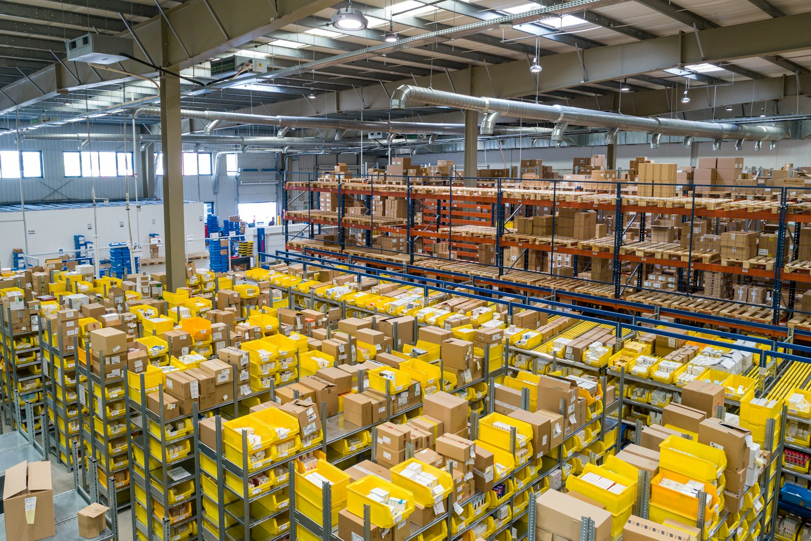 Warehouse aisles with organized inventory bins